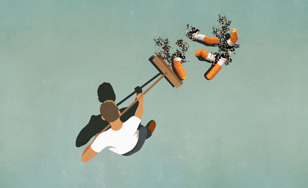 Top down illustration of a man using a push broom to sweep up large cigarette butts and ash. 